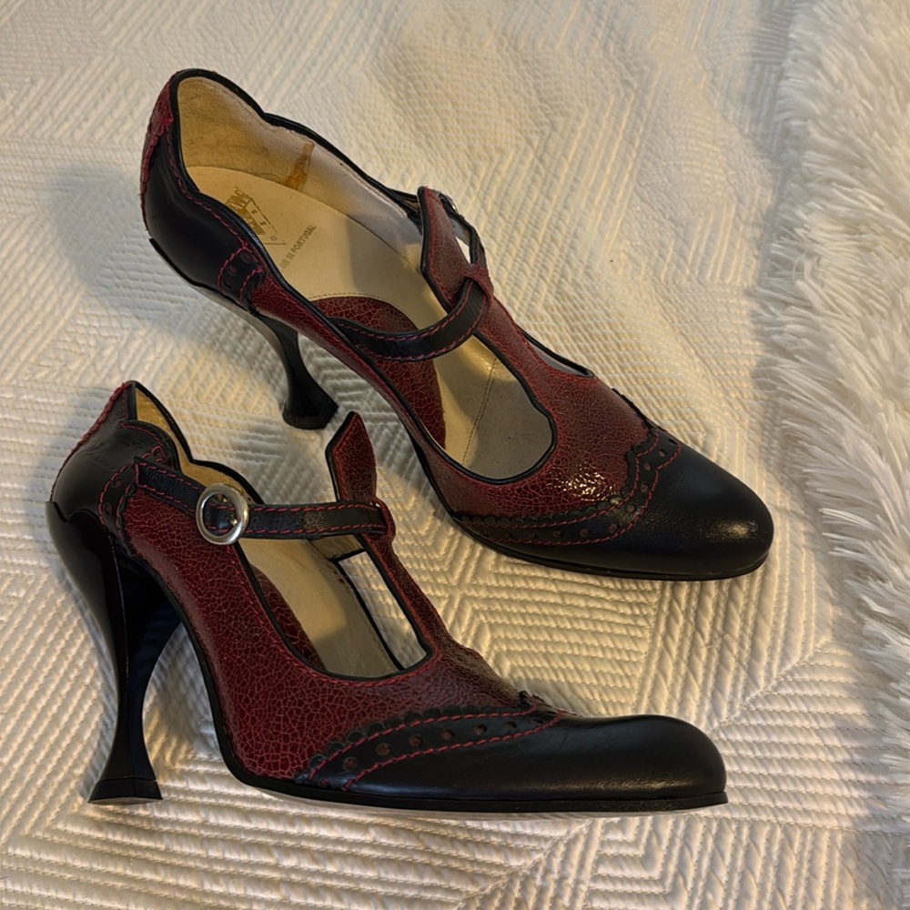 John Fluevog made in Portugal size 8 black and red heels. Like new. Never worn